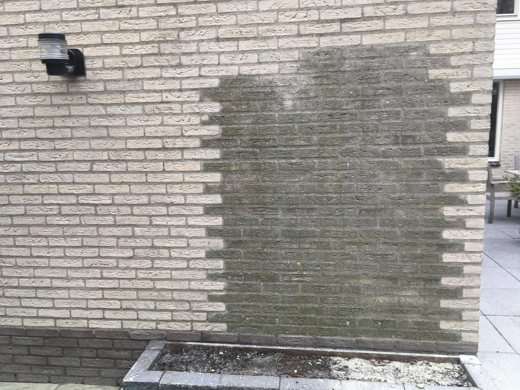 zandstralen van muur